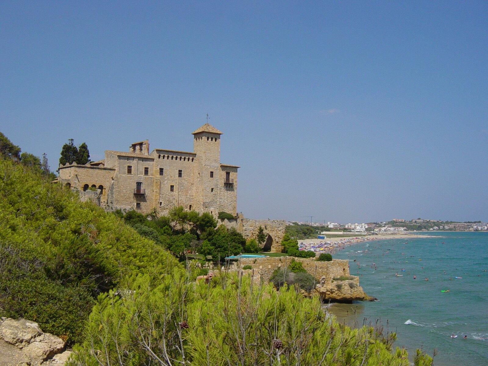 Tamarit castle on a rocky headland above the Mediterranean